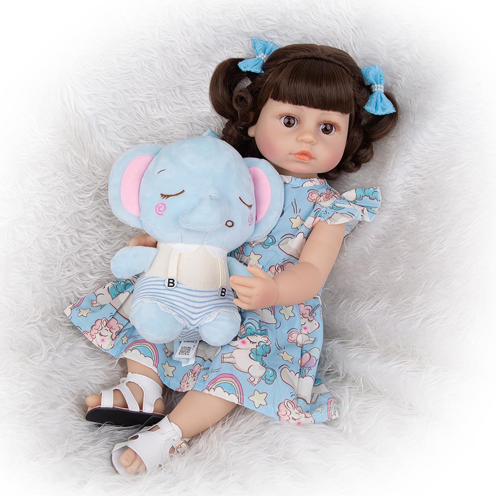 Boneca Bebê Reborn Fofa 55cm Corpo Siliconado Cabelo de Cachos